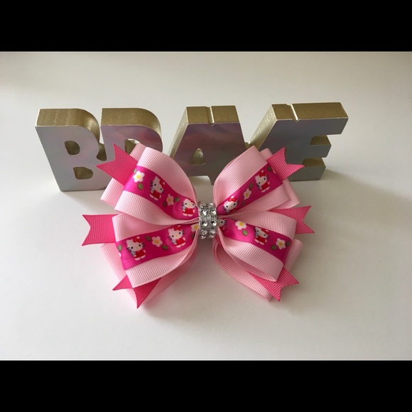 Pink hello kitty bow🎀 - Picture 1 of 2